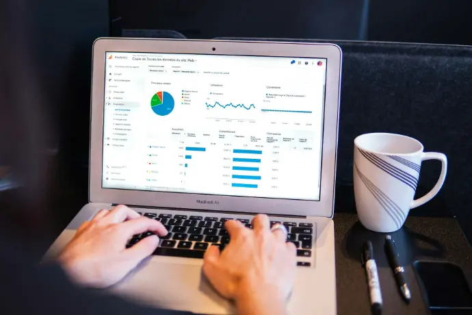 SEO Service - Digital Tarun person using macbook pro on black table
